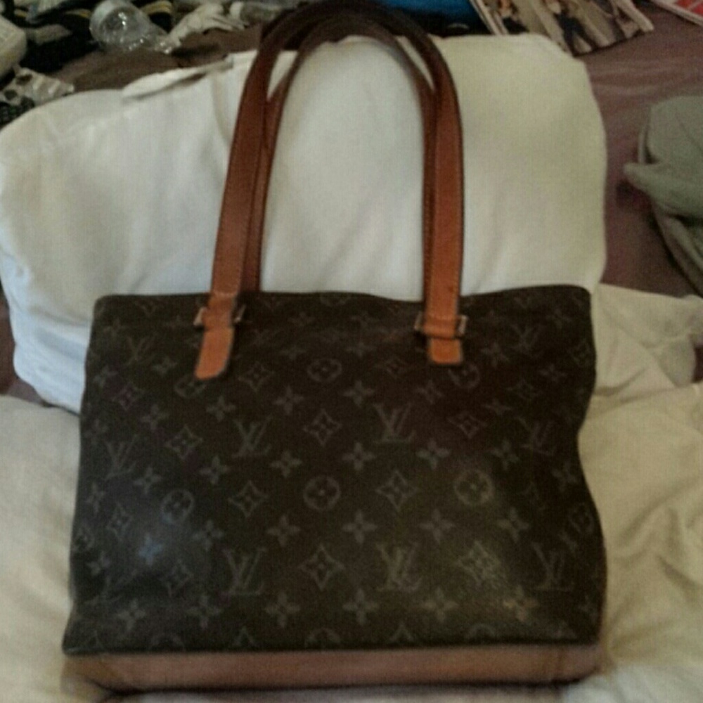 Authentic Louis Vuitton leather monogram handbag.